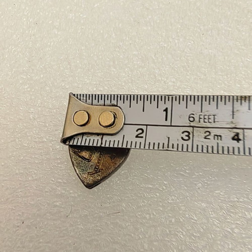 Silver 950 badge used with initials VG