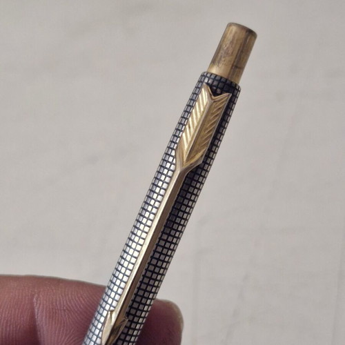 Parker pen in like new condition, possibly silver or silver-plated