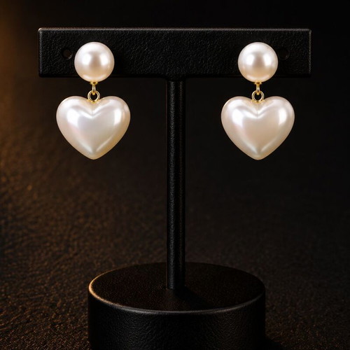 Exis Jewellery gold earrings with pearl and heart pendant