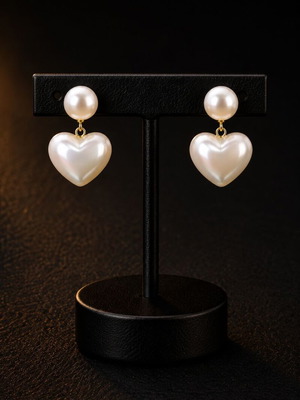Exis Jewellery gold earrings with pearl and heart pendant