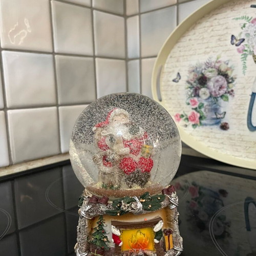 Christmas snow globe with Santa like new