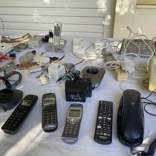Set of old cables, sockets and telephony devices used