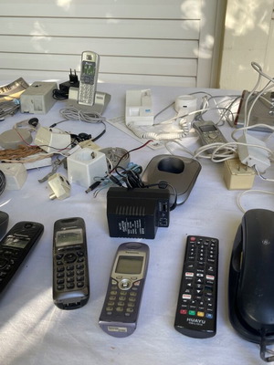 Set of old cables, sockets and telephony devices used