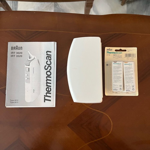 Brown electronic ear thermometer new with two sets of covers