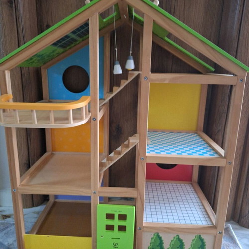 Hape wooden dollhouse like new
