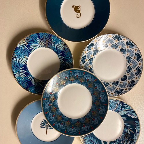Coffee cup set used with one broken saucer