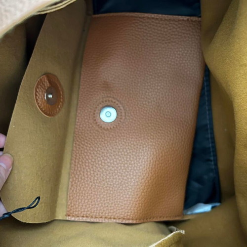 Brown shoulder bag with flap used