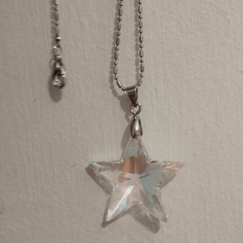 Star necklace with silver chain like new