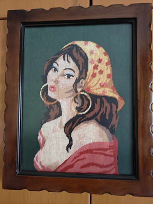 Textile painting used with frame, embroidered with complete stitch