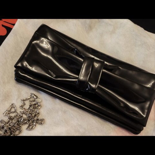 Bag - envelope black patent leather with bow detail and chain like new