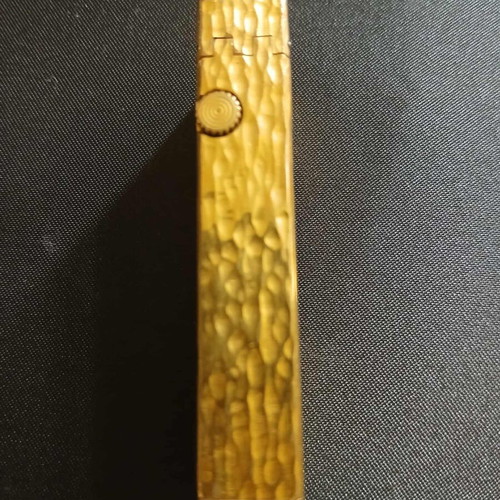 Dunhill Rollagas lighter used with goldplated finish and embossed design