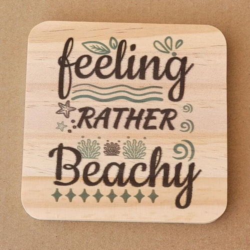 Wooden summer coasters with seasonal designs
