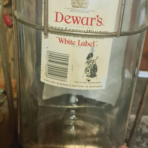 Dewar's White Label whisky used large 4.5L bottle with metal cradle vintage