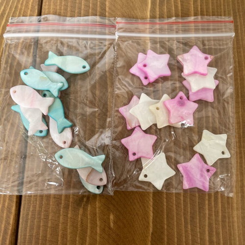 Mother of pearl beads pack like new, stars and fish shapes