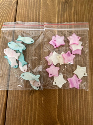 Mother of pearl beads pack like new, stars and fish shapes