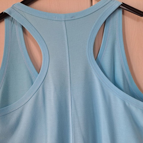 Sleeveless top new turquoise with pon pon