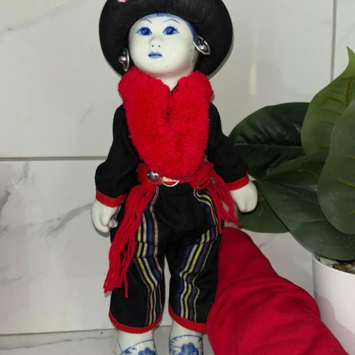 Vintage porcelain doll of Yao tribe like new