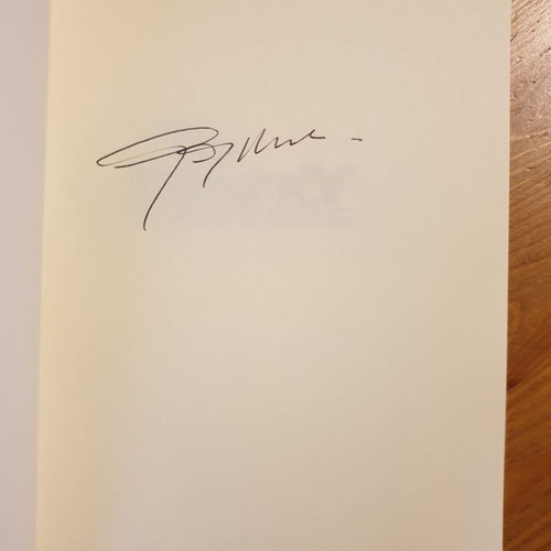 To Manitou book new with signature by Graham