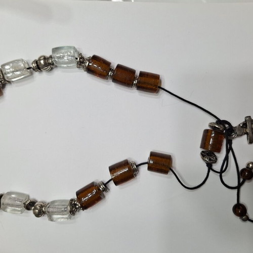 Decorative worry beads used, glass in red and brown colors