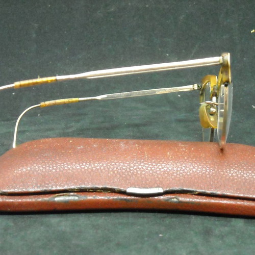 Antique women's butterfly glasses with case in good condition