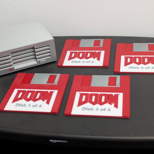 Doom coasters set like new, 4 pieces with holder