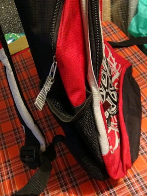 School bag used, red with multiple compartments