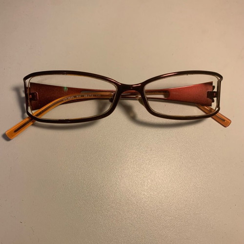 Vogue eyeglasses like new with daisy design