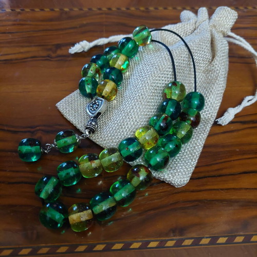 Komboloi from resin with 29+2 beads and amber powder like new