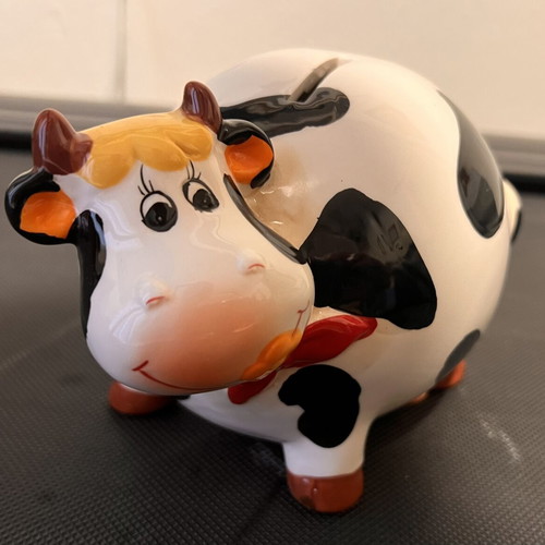 Ceramic Cow Piggy Bank like new, decorative and cute