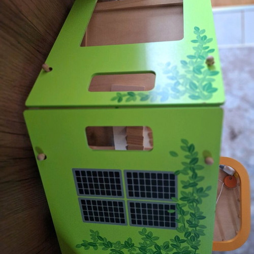Hape wooden dollhouse like new