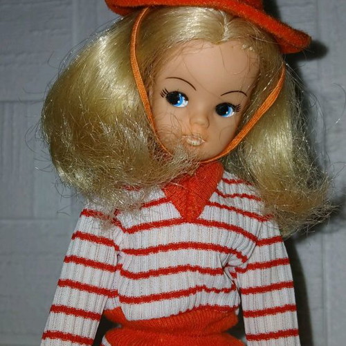 Sindy Pedigree doll used with dress, shoes, hat, and stand