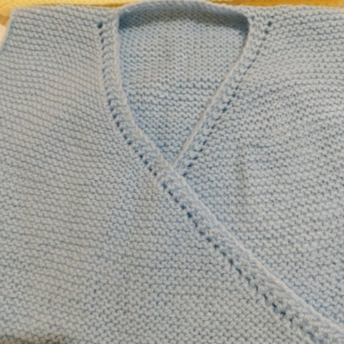 Handmade knitted baby sleeveless cardigans, yellow and blue