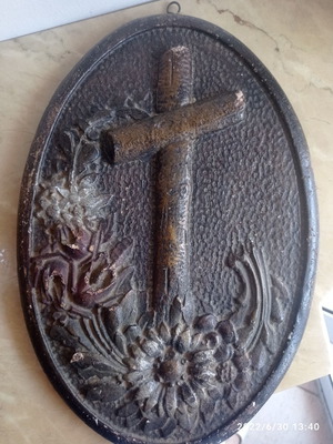 Old relief cross used, made of plaster