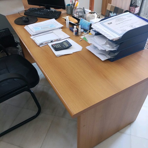Desk with bookshelf and auxiliary table used