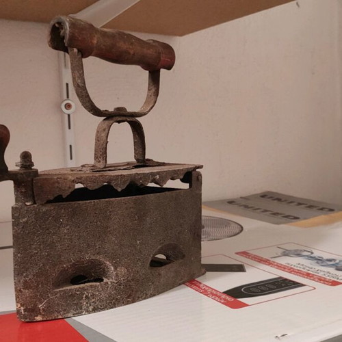 Antique iron used, coal-heated, 100 years old
