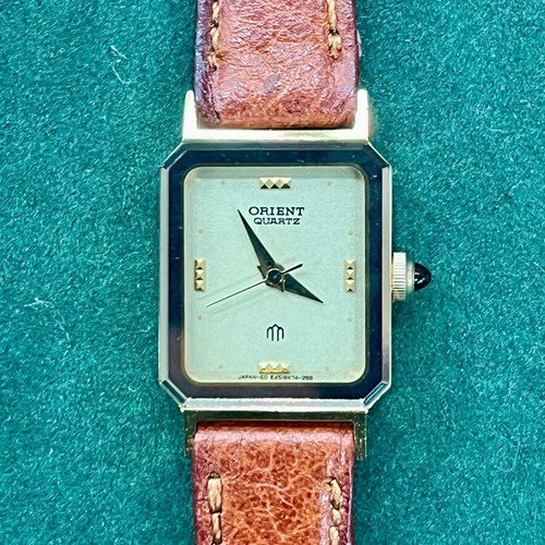 Orient wristwatch like new, beige and gold, Japan made