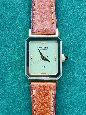 Orient wristwatch like new, beige and gold, Japan made