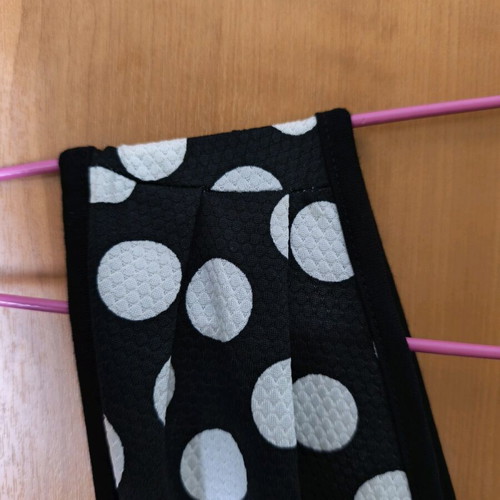 Juicy one-piece jumpsuit like new, sleeveless wrap, black-white