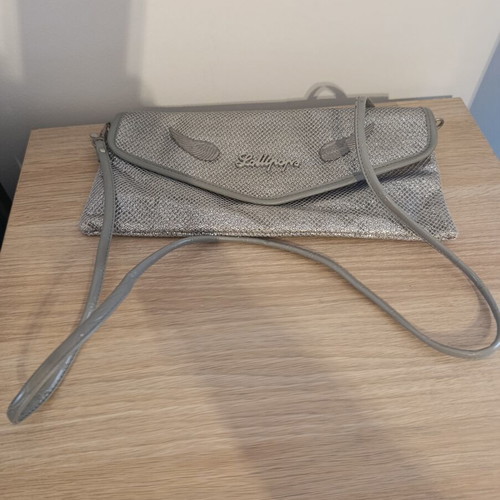 Lollipops bag silver color with decorative wings, like new