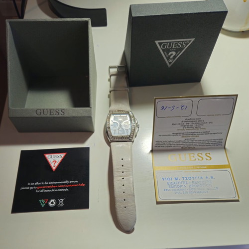Guess women's watch used with box and purchase receipt