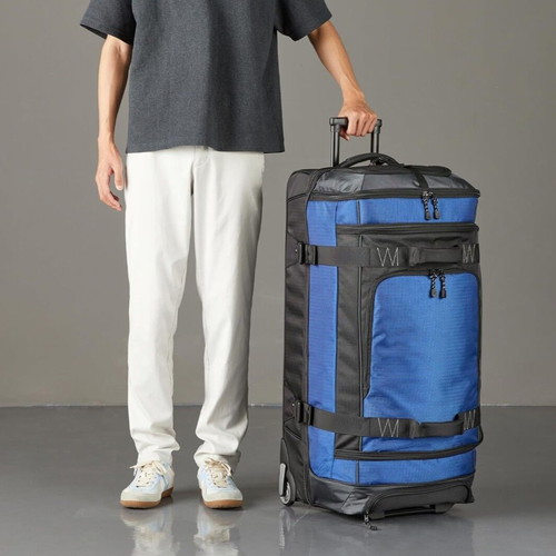 AmazonBasics Ripstop Wheeled Duffel Suitcase 87 Liter Blue like new
