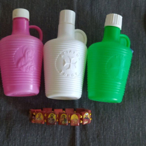 Bracelet with saints and holy water bottles pack used