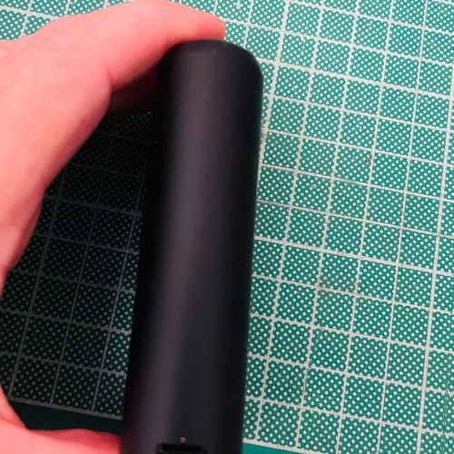 Glo Hyper tobacco heating device used with charging cable