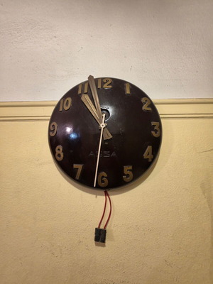 Vintage ASSA electric wall clock, bakelite, Germany
