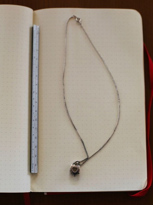 Silver necklace with heart used