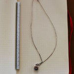 Silver necklace with heart used