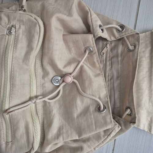 Backpack new beige with multiple pockets