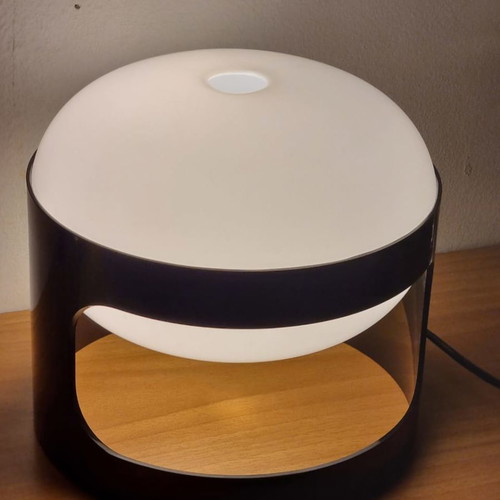 Lamp model KD 27 used, designed by Joe Colombo