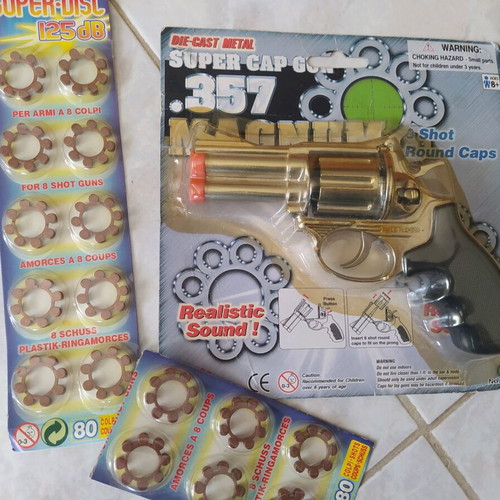Children's toy gun new with caps