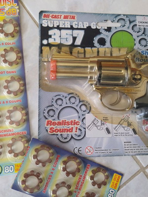 Children's toy gun new with caps